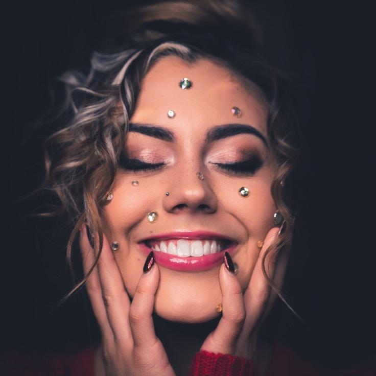 Kaveri Mehta, Lead Design Curator at Clear Path Works, reviewing corporate floral arrangements